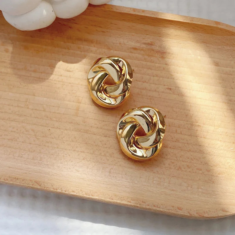 Brinco espiral de ouro