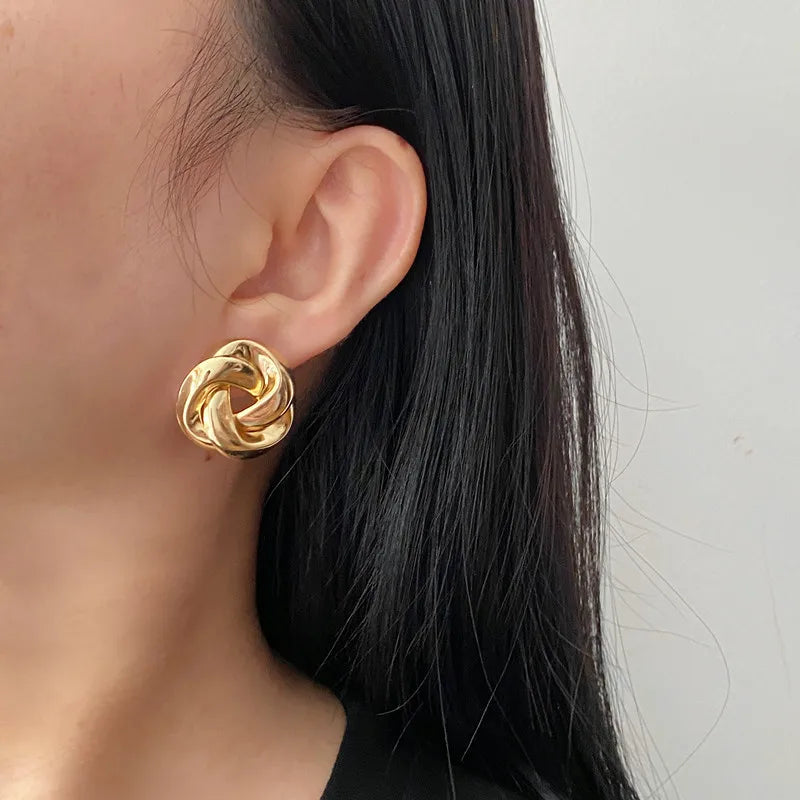 Brinco espiral de ouro