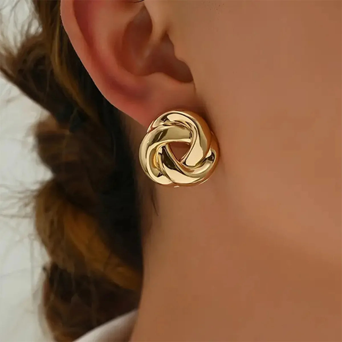 Brinco espiral de ouro