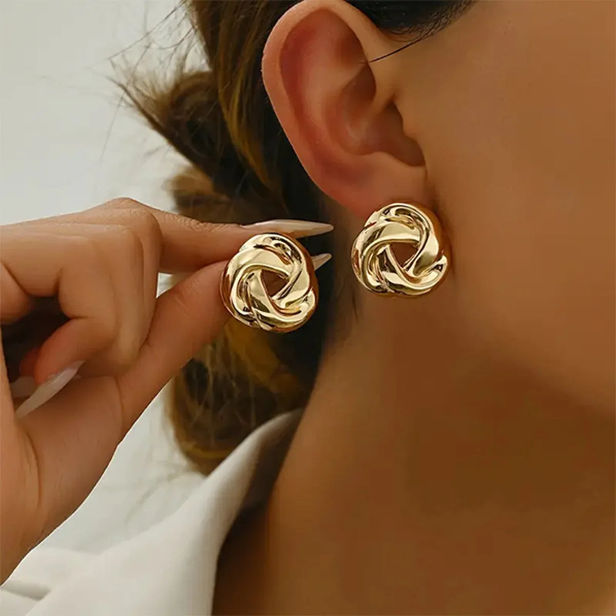 Brinco espiral de ouro